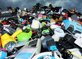 A photo of electronics at a landfill site