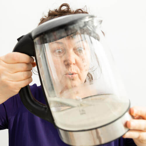 person with kettle