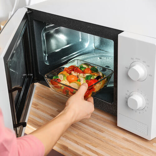 microwave with dish of food