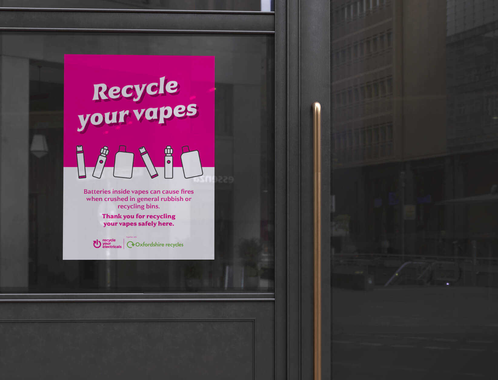 a recycle your vapes poster on a shop window