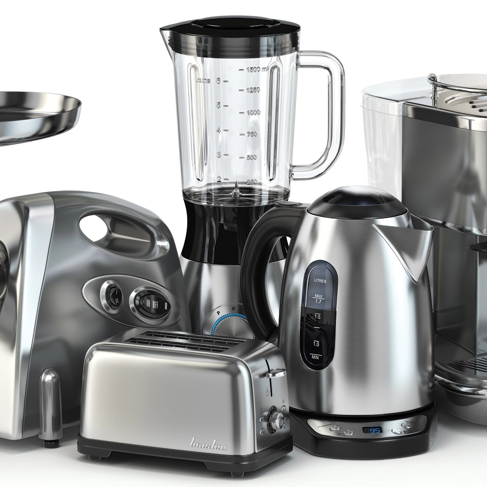 a collection of electrical kitchen appliances on a table