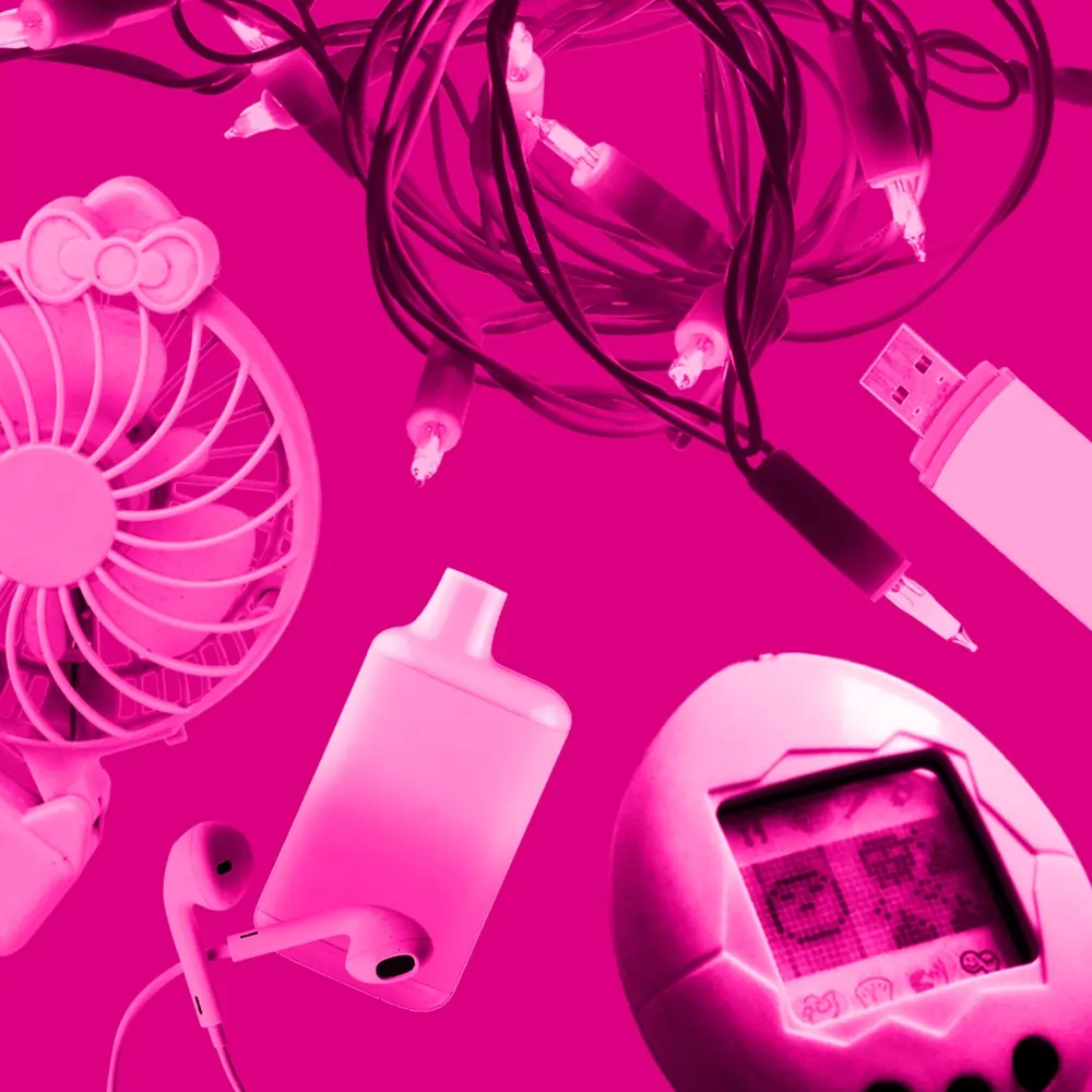 small electrical items, including Christmas lights and a vape, floating in a pink haze against a bright pink background